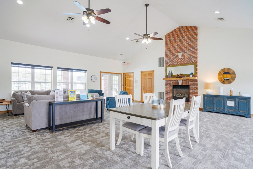 Dining and lounging area in the community clubhouse at Williamsburg Park Apartments