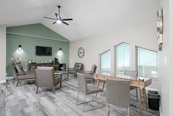 the front office with some chairs and a desk at Southwind Villas clubhouse