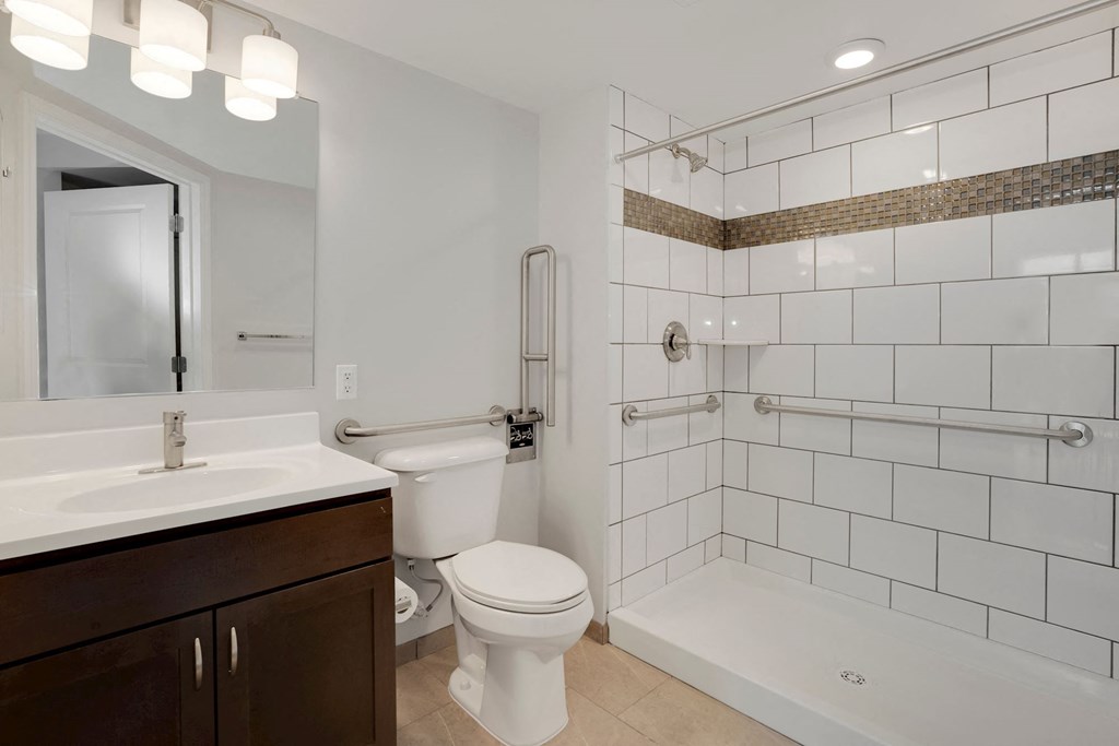 a bathroom with a toilet sink and bathtub