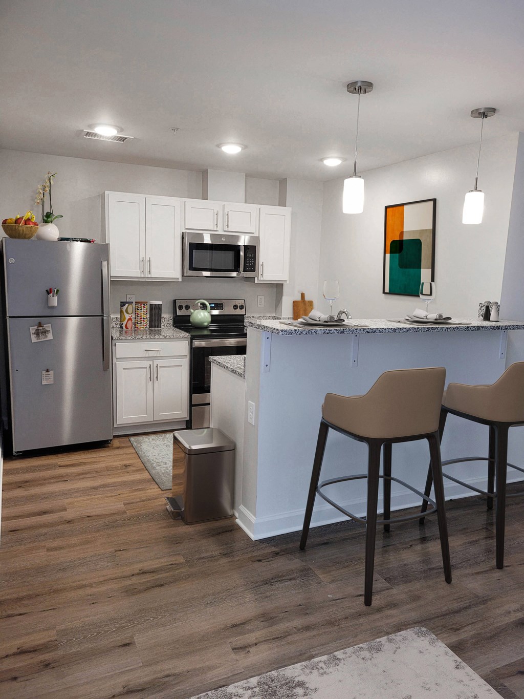 a kitchen and dining area in sandy spring village