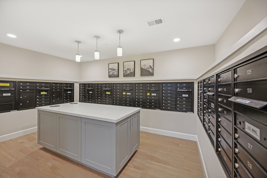 A control panel room with a white cabinet in the middle.