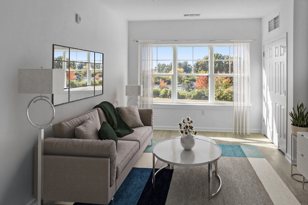 a living room with a couch and a coffee table