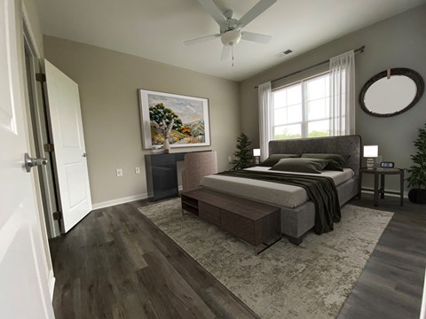 a bedroom with a bed and a ceiling fan
