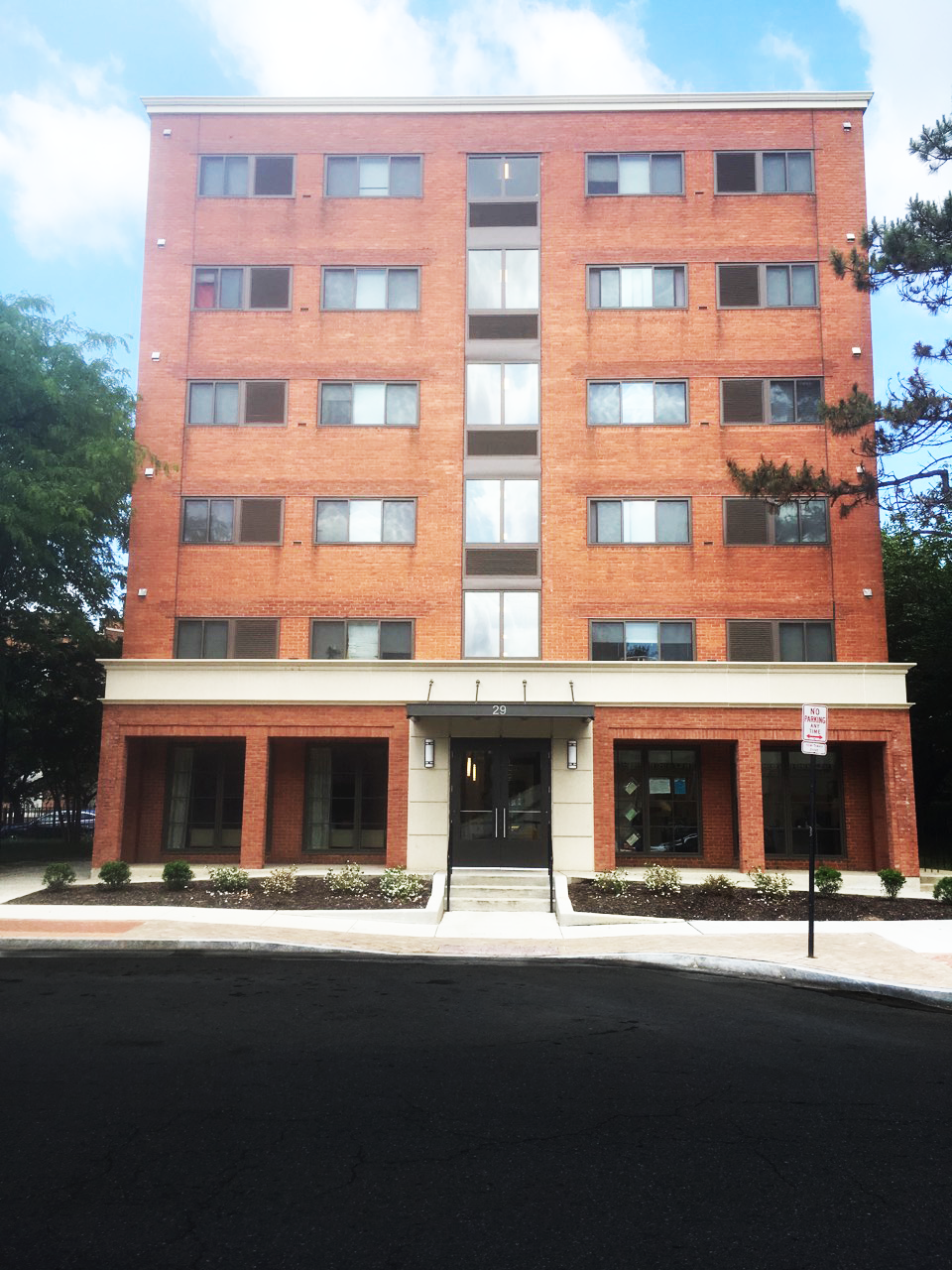 a red brick building on a sunny day