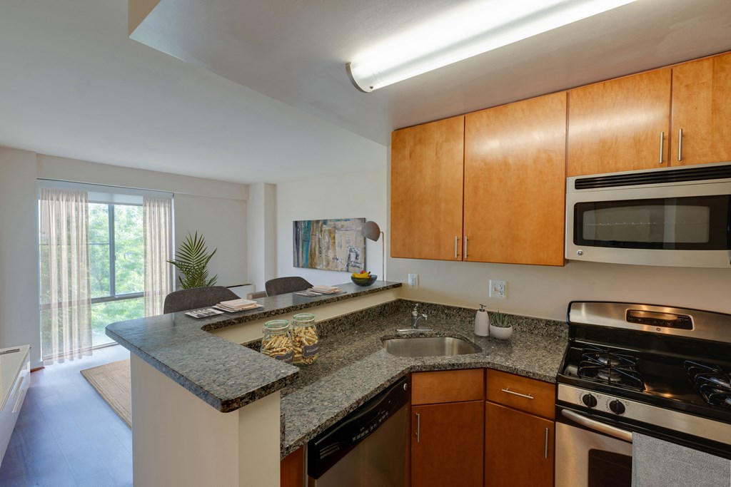 staged studio with kitchen