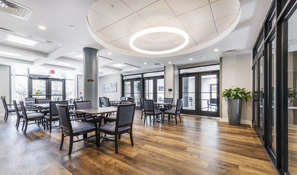 a large room with tables and chairs