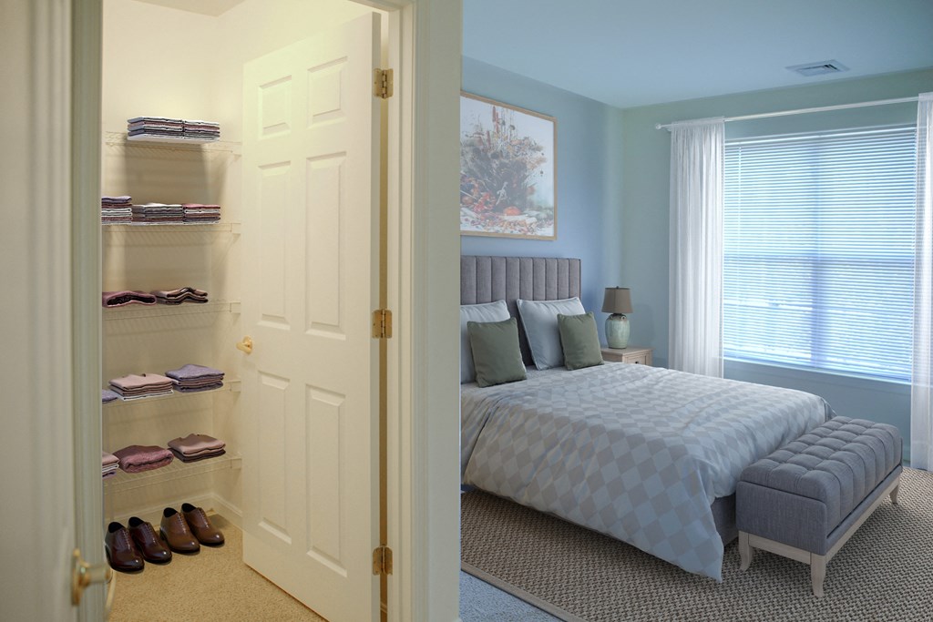 a bedroom with a bed and a closet