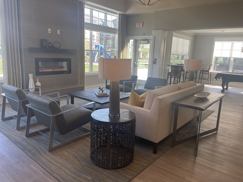 A living room with a fireplace and a couch.