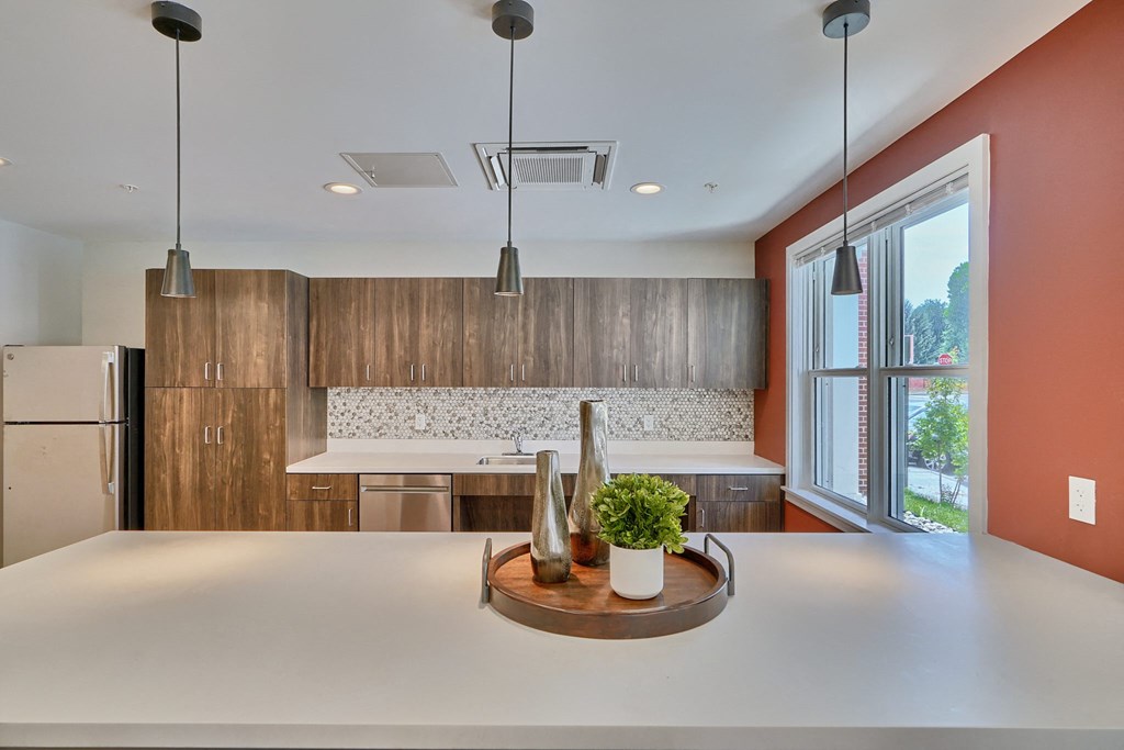 A modern kitchen with a large island in the middle.