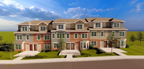 A large, multi-story residential building with a brick facade and multiple windows.