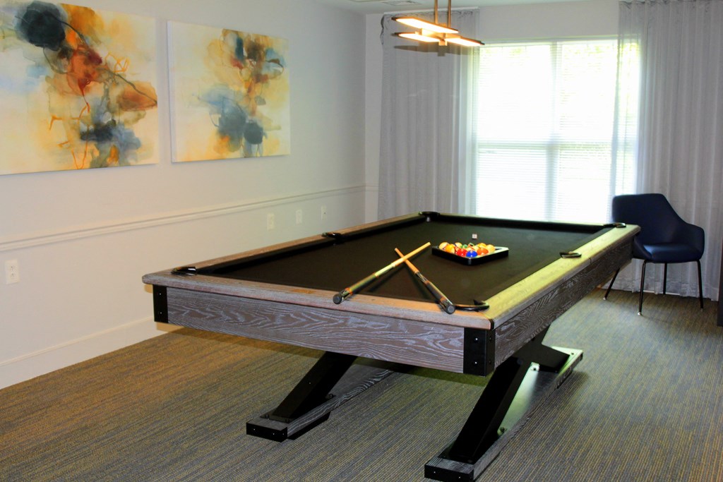 a billiards table in a living room