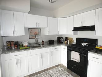 this is a photo of the kitchen in a 1 bedroom apartment at deer hill apartments in c - Photo Gallery 2