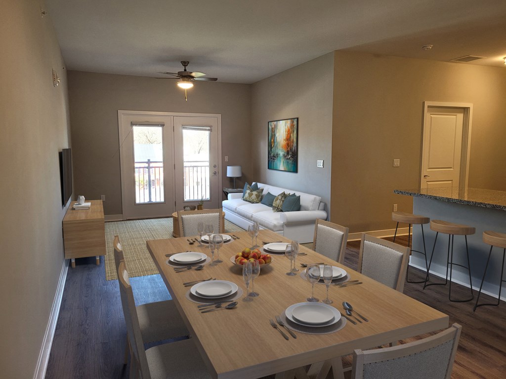a living room and dining room with a wooden table and chairs