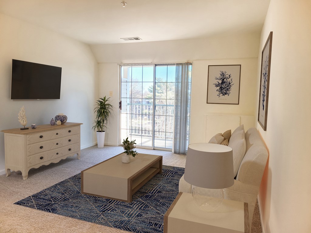 a living room with a couch and a coffee table