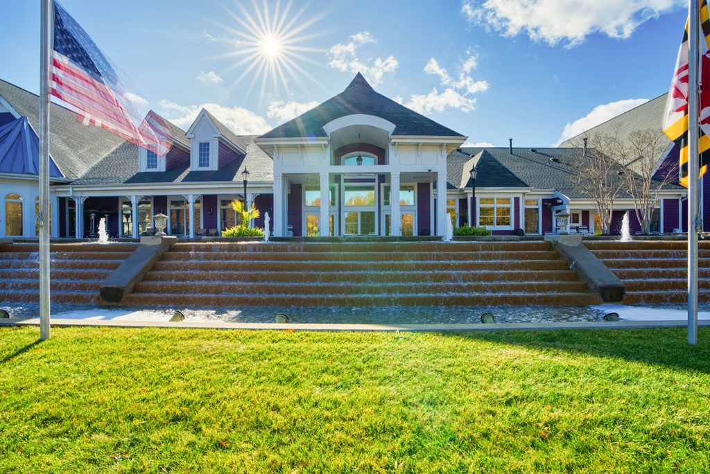 the front of a building flags in front of it