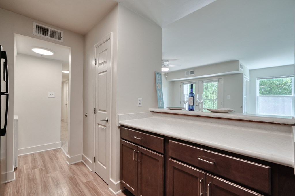 a kitchen with wooden cabinets and a counter top