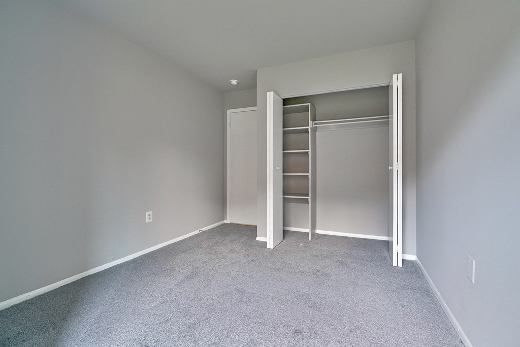 bedroom with storage in closet