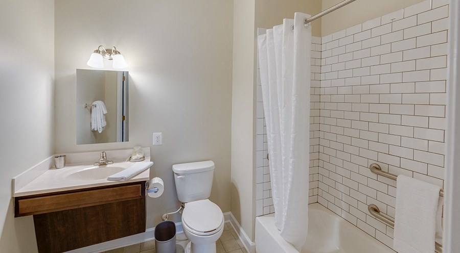Bathroom with shower tile detailing
