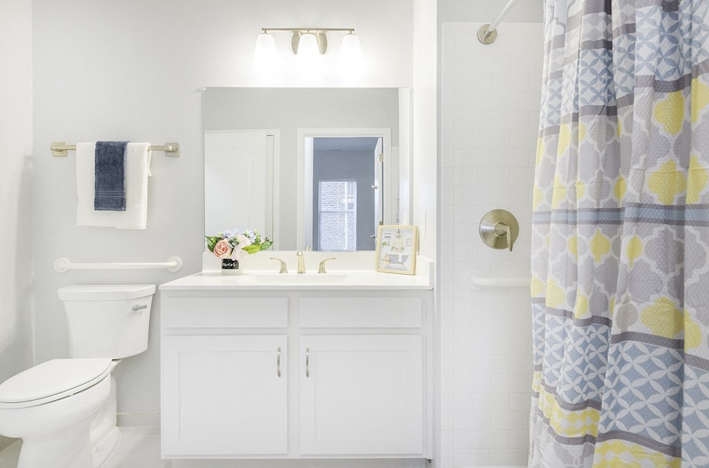 Bathroom with vanity and shower