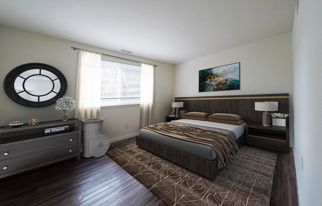 well-lit bedroom with large windows