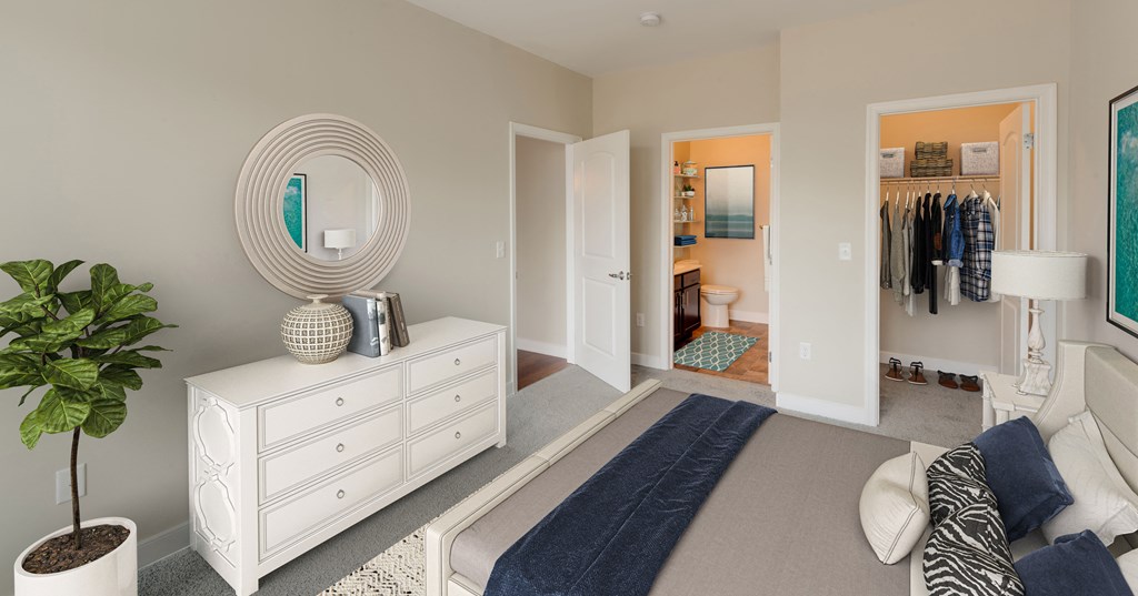staged bedroom with bathroom and closet