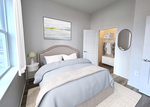 A bedroom with a large bed and a painting on the wall.