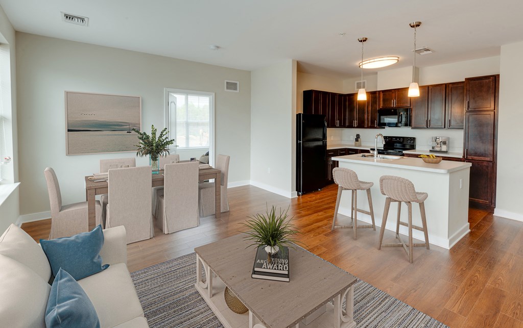 staged kitchen living room dining room area