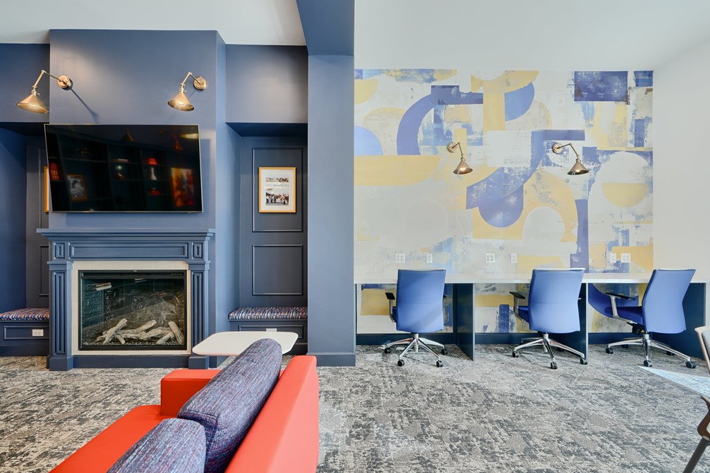 Now leasing senior 1-bedrooms in Baltimore, MD. A blue and yellow abstract painting on a wall.