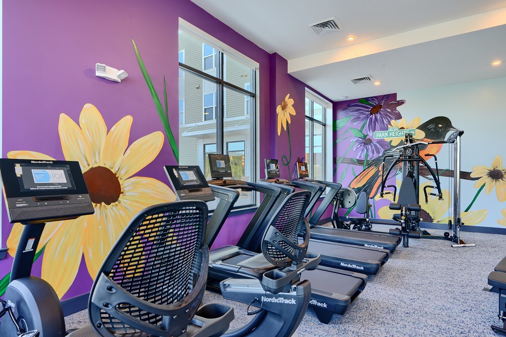 Now leasing senior 1-bedrooms in Baltimore, MD. A gym with treadmills and exercise bikes.