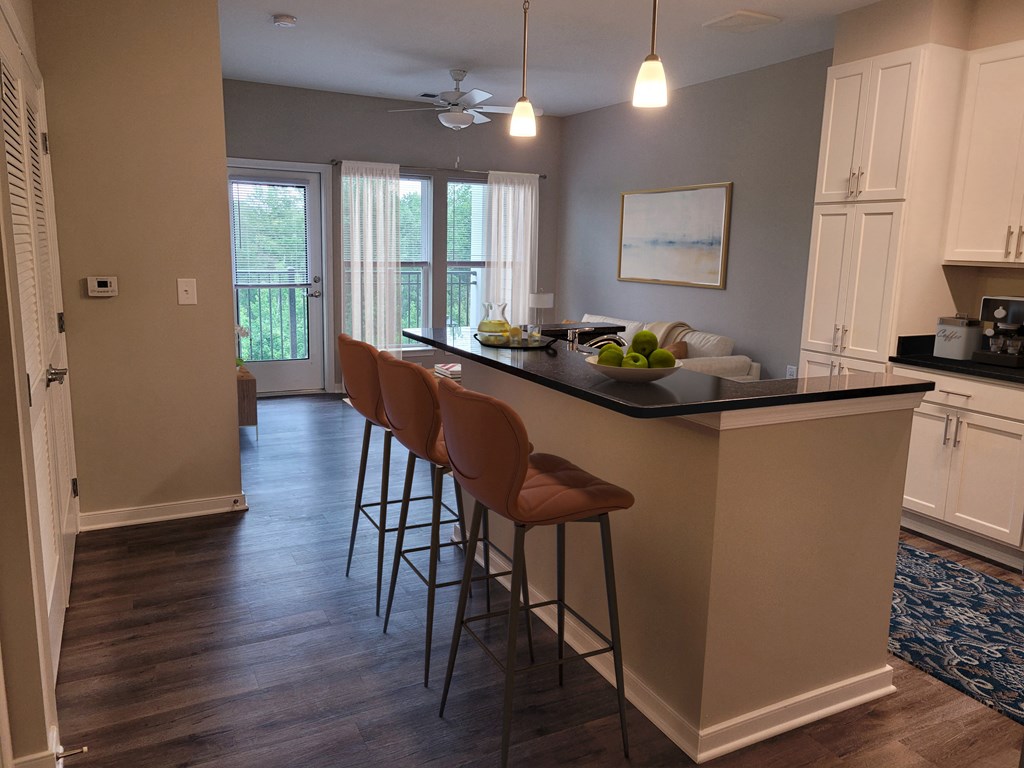 staged apartment kitchen dining living space