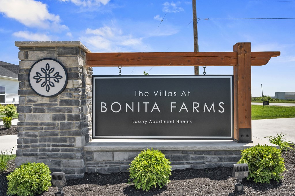 a sign for the villas at bonita farms