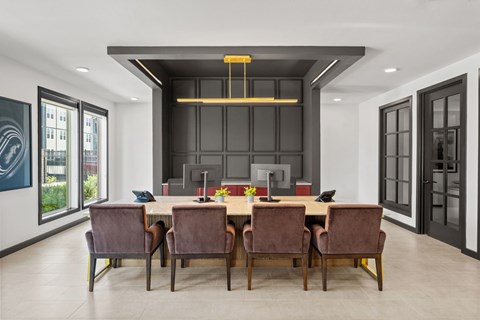 Leasing office at Aviator 1518 apartments in Schertz, TX with desks and consultation area.