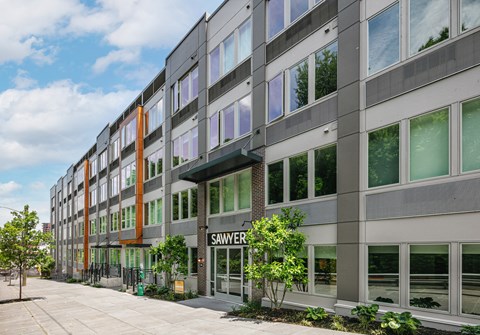A modern building with the name SAWER on the front.