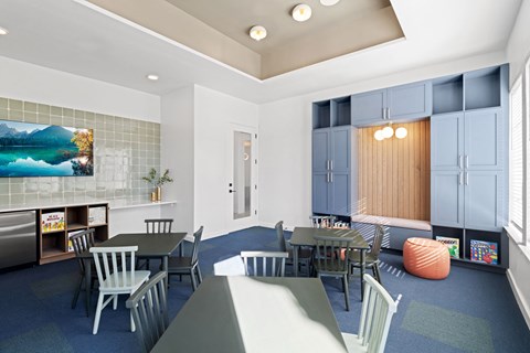 Inviting resident lounge featuring comfortable seating, contemporary décor, and a welcoming space for relaxation and connection.