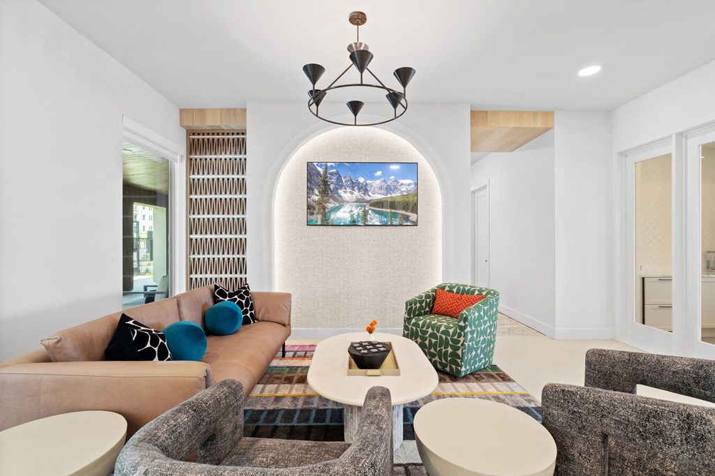 a room with couches and chairs