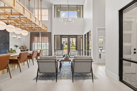 Apartment community amenity space highlighting stylish gathering areas, modern design elements, and comfortable resident accommodations.