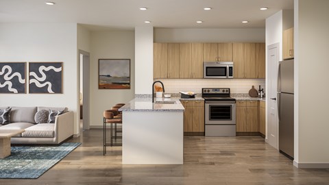 A modern kitchen with a white island and wooden cabinets.