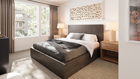 A bedroom with a large bed and a window with curtains.