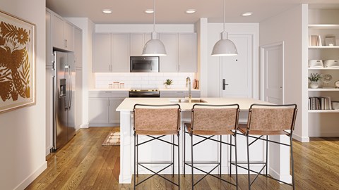 A modern kitchen with a dining table and chairs.