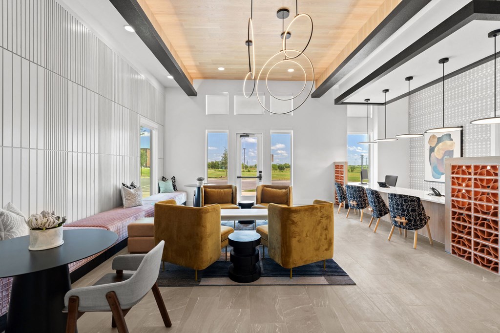 a room with couches chairs and a table