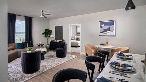 a living room and dining room in an apartment