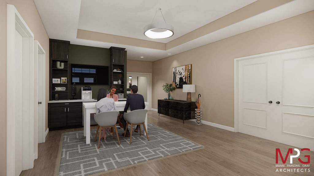 a family sitting at a dining table in a large living room