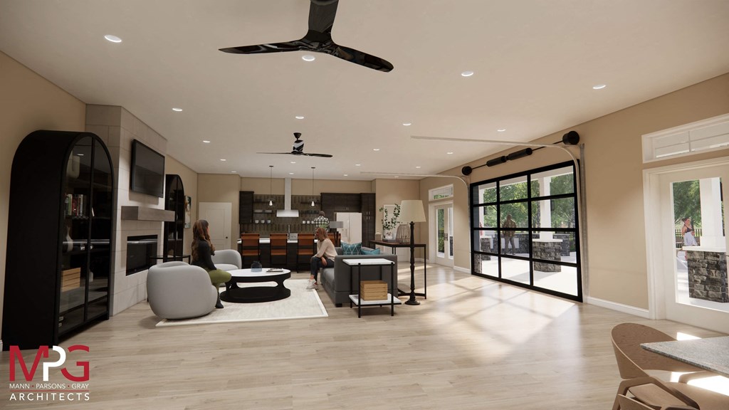 a large living room with a kitchen and a living room