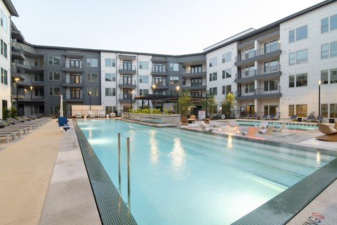 A large indoor swimming pool in a residential building.