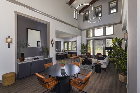 Inviting resident lounge featuring comfortable seating, contemporary décor, and a welcoming space for relaxation and connection.