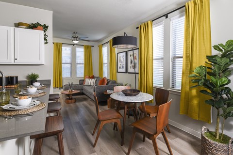 Bright living room with comfortable seating, modern finishes, and a welcoming atmosphere filled with natural light.