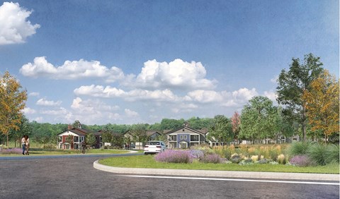 A street view of a residential area with houses and trees.