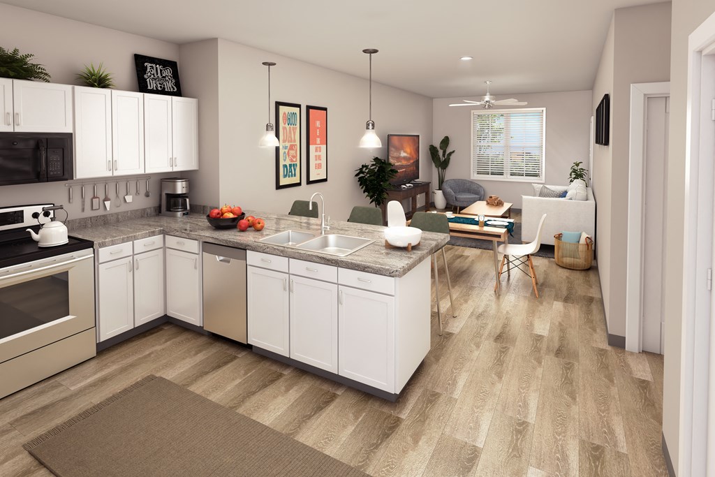 an open kitchen and living room with white cabinets