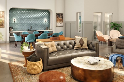 A living room with a grey couch and a round coffee table.