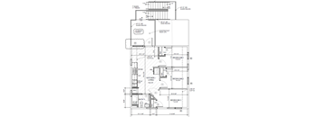 A detailed architectural drawing of a house plan with labeled rooms and measurements.